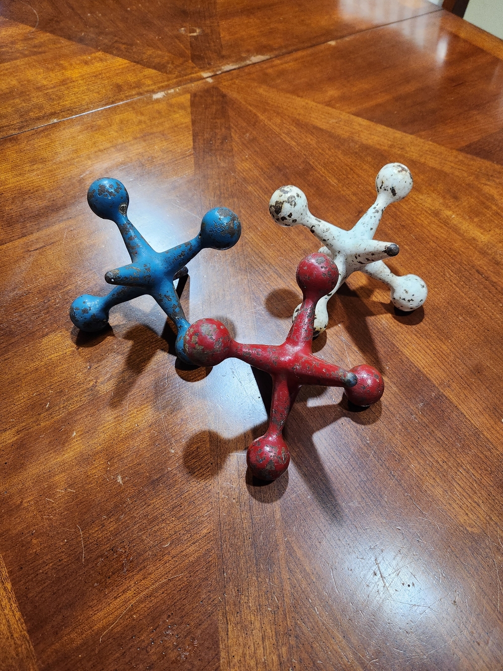 3 Antique Cast Iron Toy Jacks Decorations.